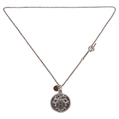 hermes ex libris parisien|Hermes ex libris necklace.